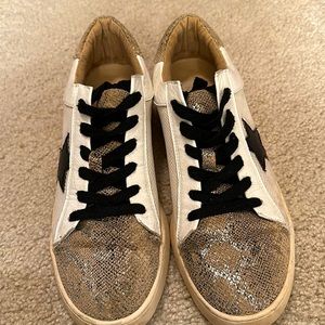 White Raven sneakers size 8.5.